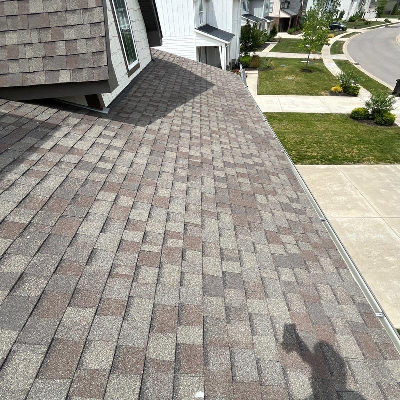 Asphalt shingle roof inspected for hail damage in College Grove