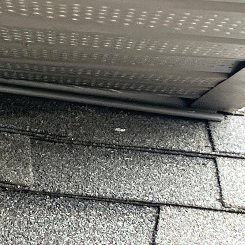 Roof shingles close-up showing hail impact and wear