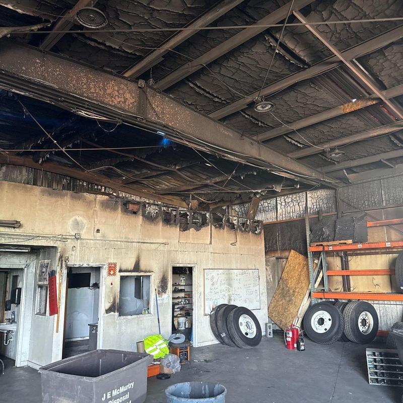 Industrial warehouse ceiling with fire damage