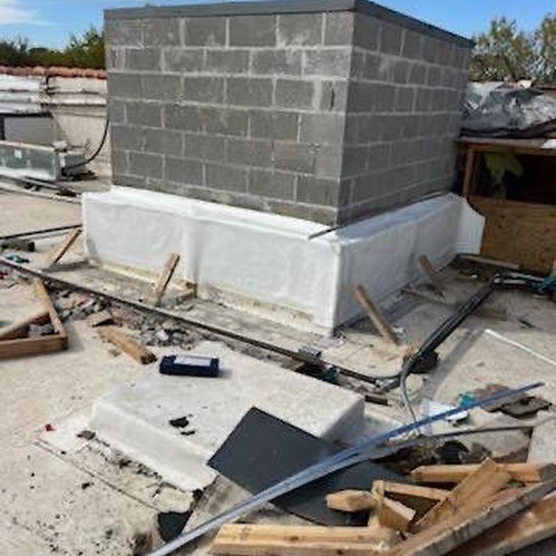 Concrete roof chimney base waterproofing and repairs Concrete roof chimney base waterproofing and repairs