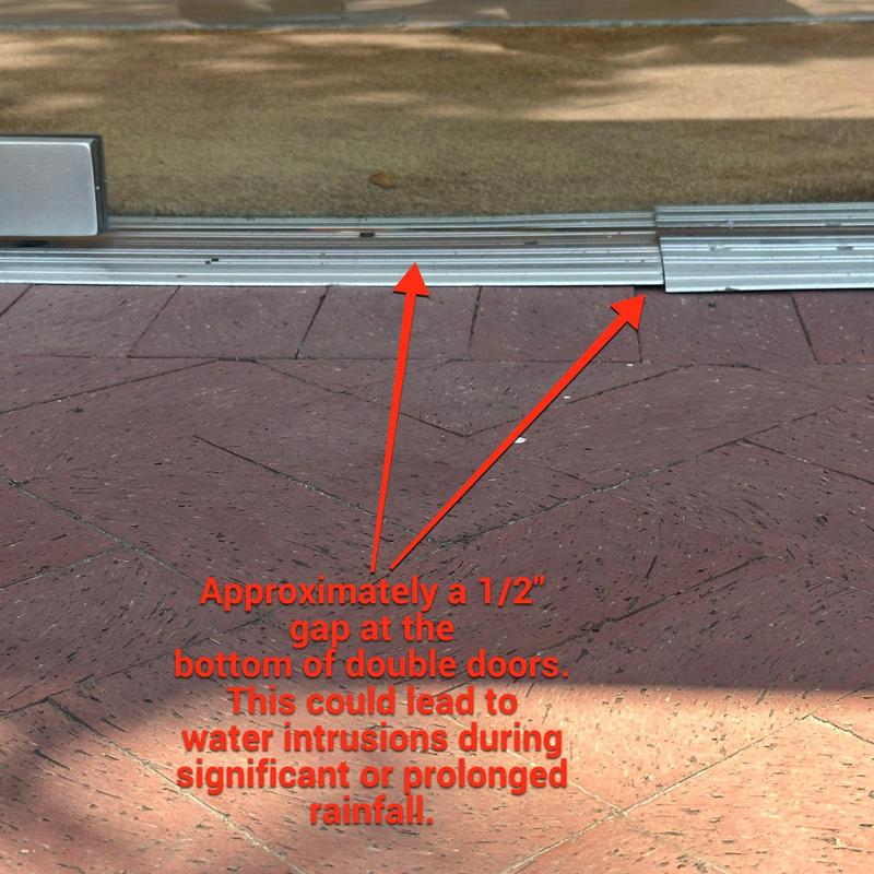 Double door bottom gap with water intrusion risk Double door bottom gap with water intrusion risk