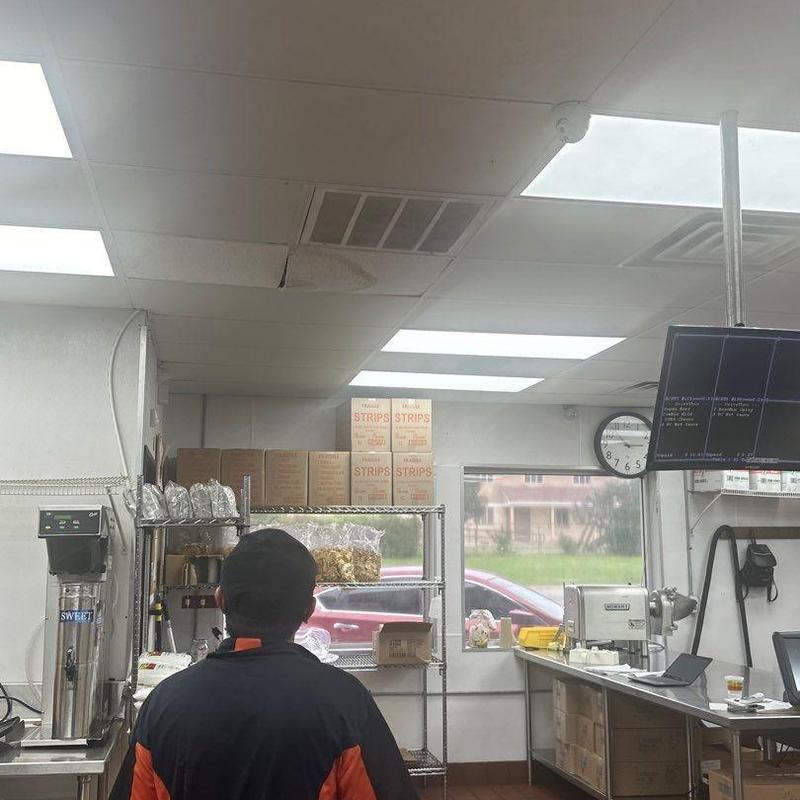 Ceiling tile with water damage inside restaurant kitchen Ceiling tile with water damage inside restaurant kitchen