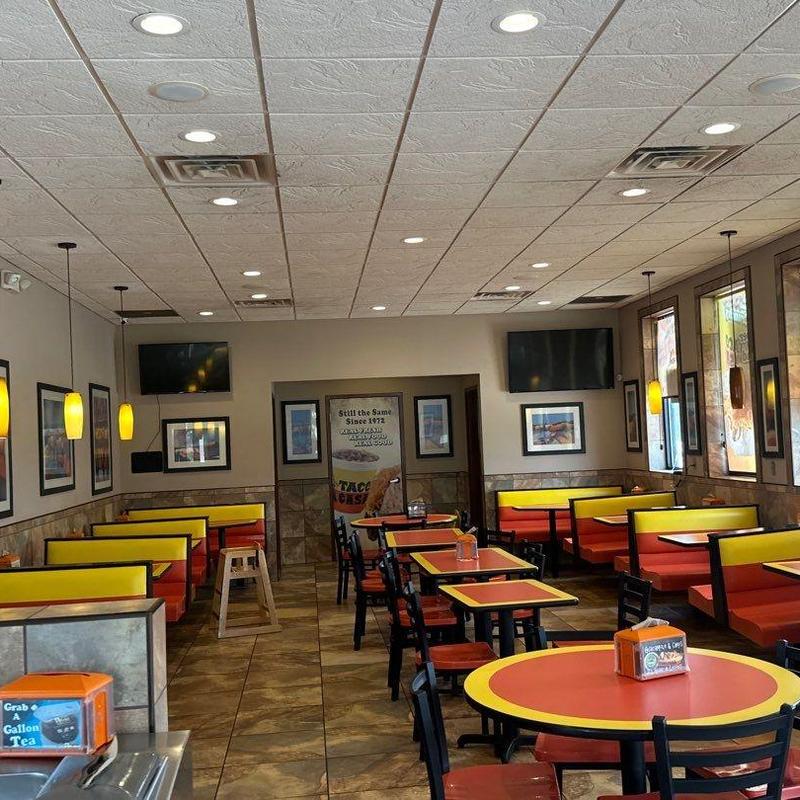 Ceiling tile and roof leak damage in restaurant interior Ceiling tile and roof leak damage in restaurant interior