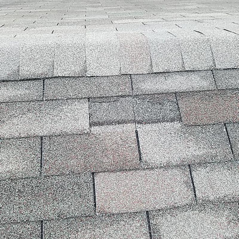Architectural asphalt shingle roof with gray blend