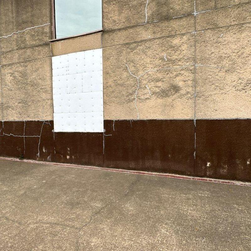 Stucco wall crack repairs and patching at church exterior Stucco wall crack repairs and patching at church exterior