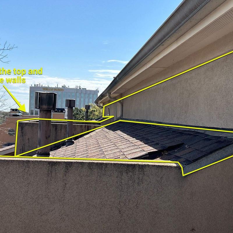 Stucco terrace walls and adjoining shingle roof sections Stucco terrace walls and adjoining shingle roof sections
