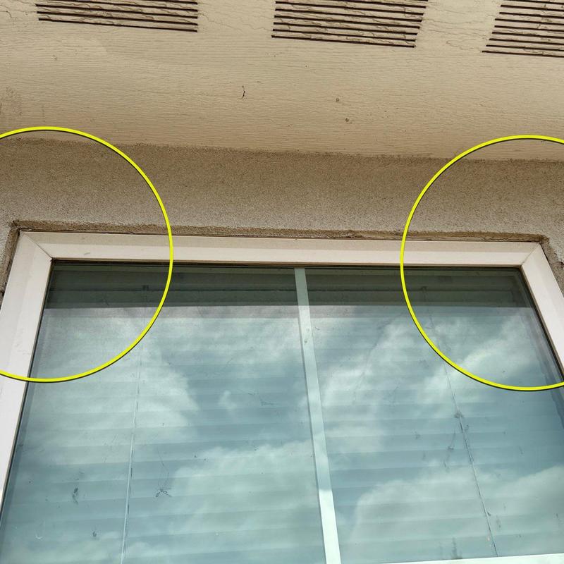Exterior stucco cracks above window frame Exterior stucco cracks above window frame