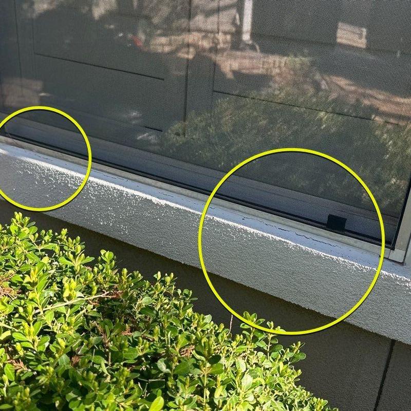 Exterior stucco cracks near window trim and sill Exterior stucco cracks near window trim and sill