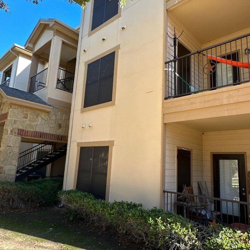 Stucco exterior wall with repaired cracks and damage Stucco exterior wall with repaired cracks and damage