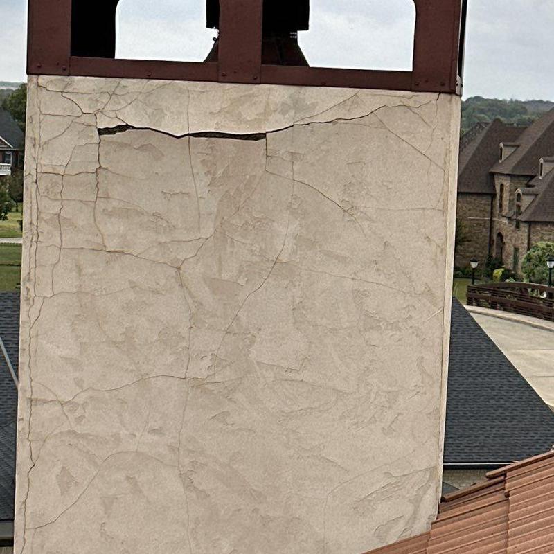 Chimney stucco with large cracks and damage Chimney stucco with large cracks and damage