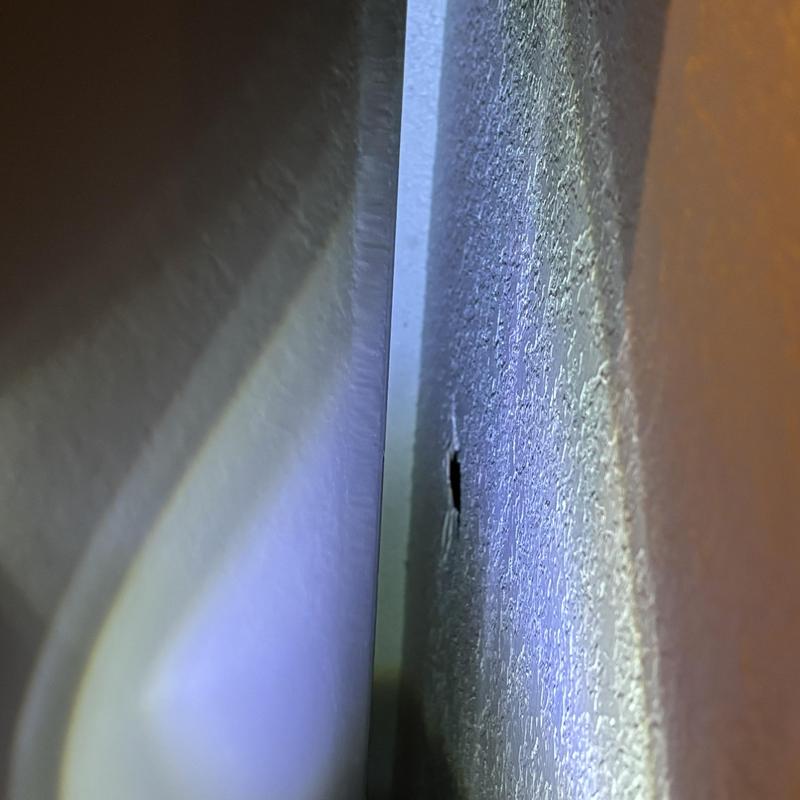 Wall surface crack inspection with flashlight lighting Wall surface crack inspection with flashlight lighting