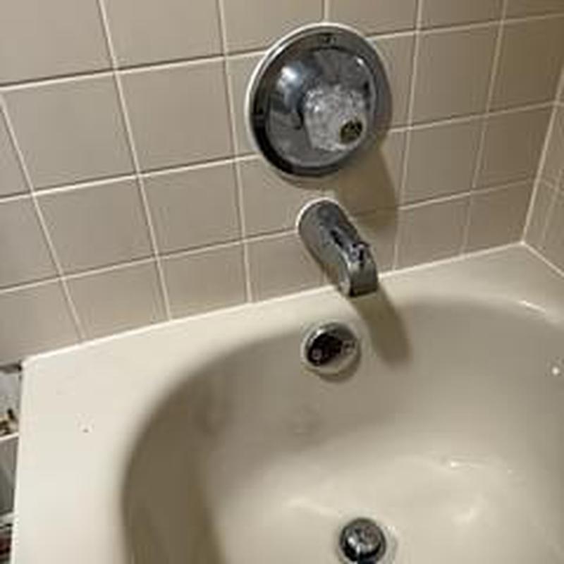 Tub diverter spout and shower handle with tile wall