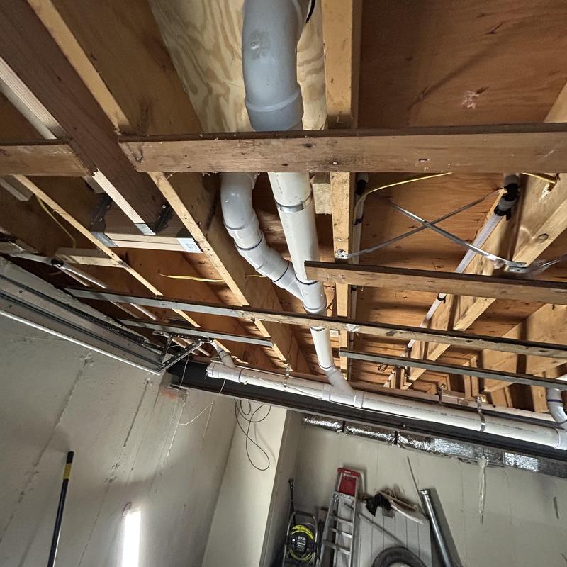 PVC drain pipes installation in bathroom ceiling framing PVC drain pipes installation in bathroom ceiling framing