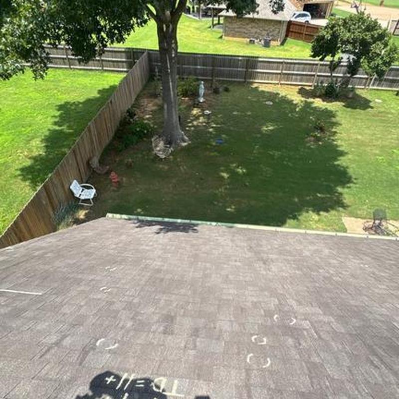 Architectural shingle roof with storm damage markings