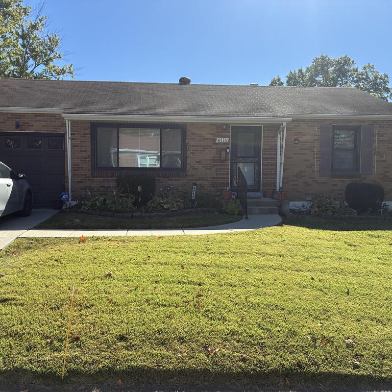 Asphalt shingle roof with hail damage inspection
