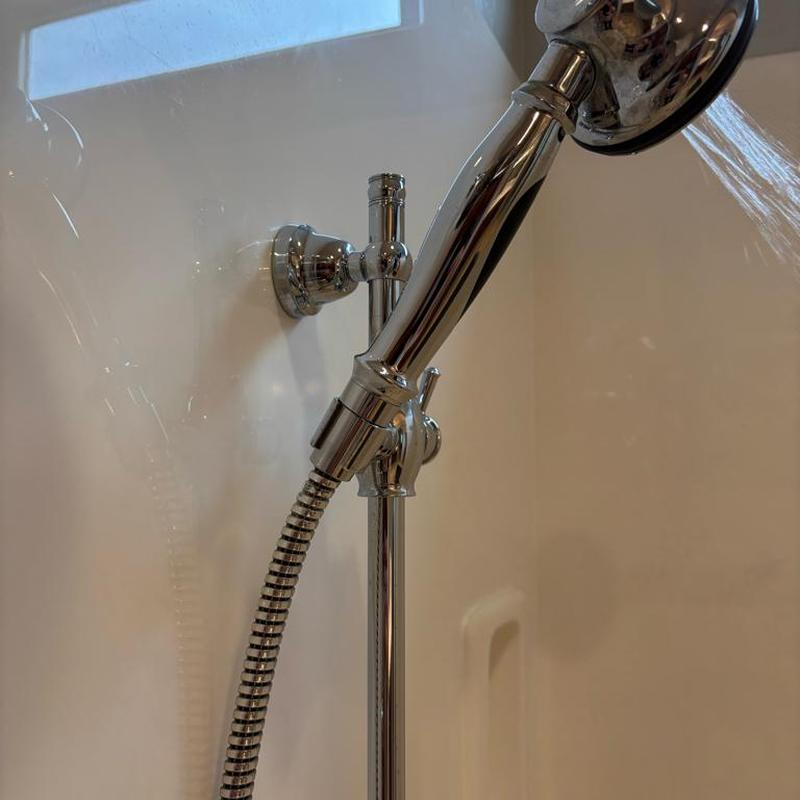 Handheld shower head with cleaned tape and valve