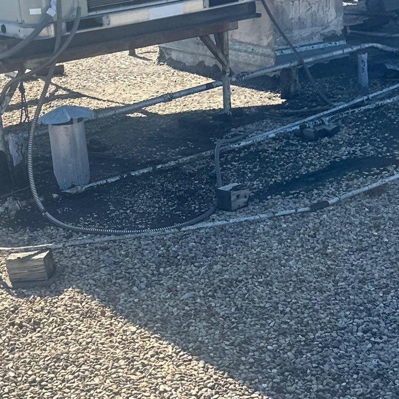 Concrete roof with HVAC unit and electrical conduits Concrete roof with HVAC unit and electrical conduits