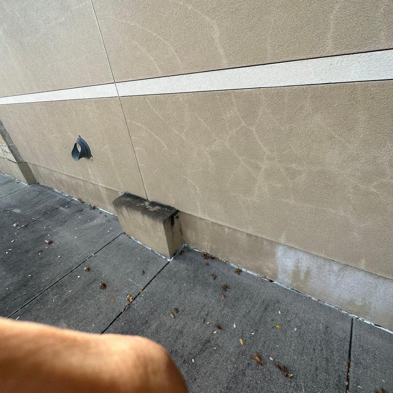 Exterior concrete block wall with weathering and discoloration Exterior concrete block wall with weathering and discoloration