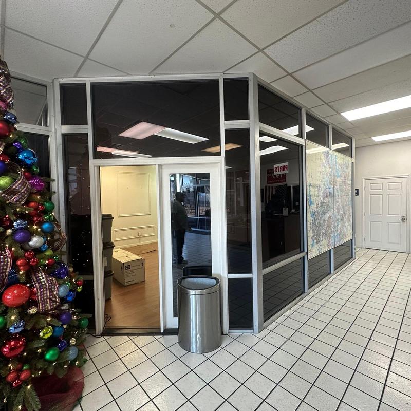 Glass office partitions with door in workspace redesign Glass office partitions with door in workspace redesign