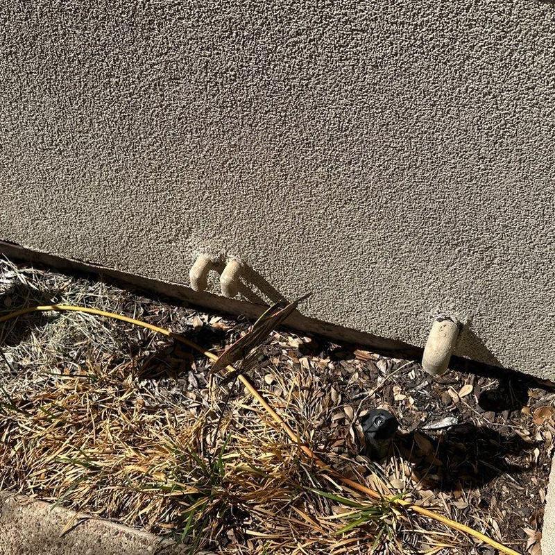 Stucco pipe protrusions with exterior wall stucco texture Stucco pipe protrusions with exterior wall stucco texture