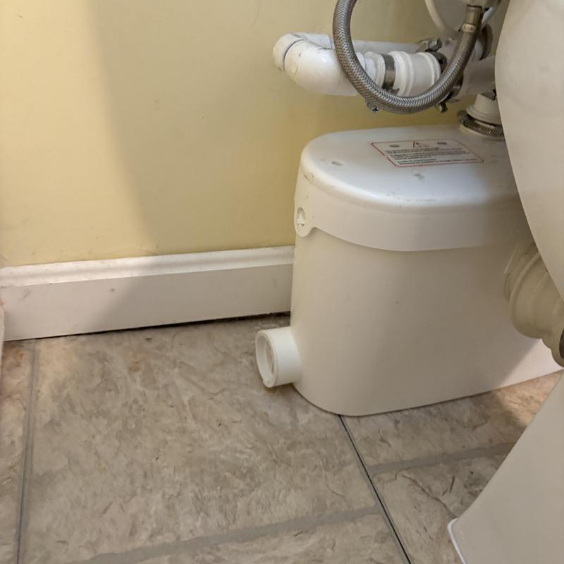Upflush macerating toilet pump with plumbing connections Upflush macerating toilet pump with plumbing connections
