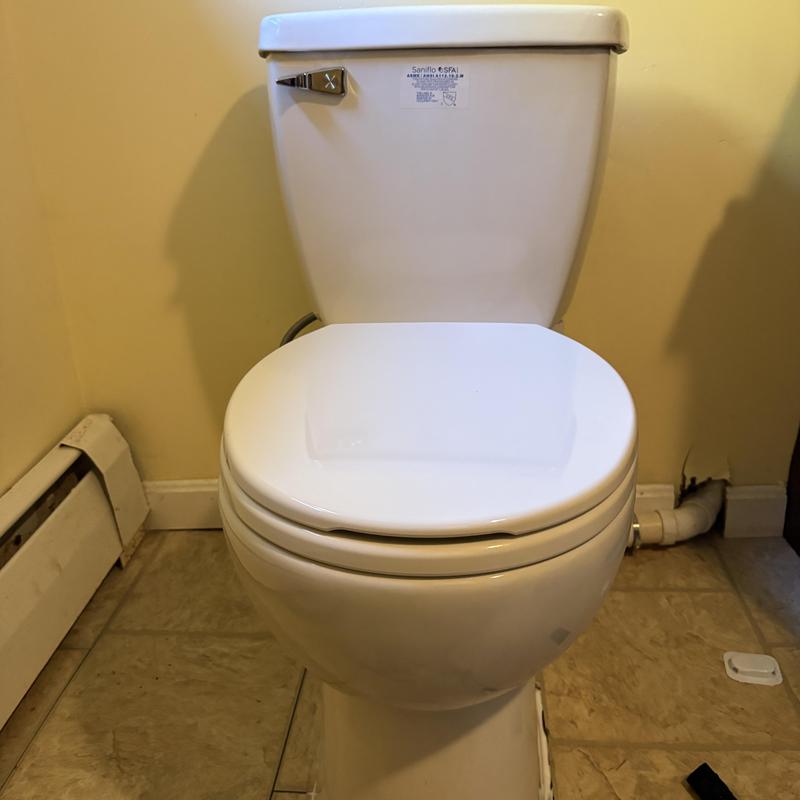 Macerating upflush toilet with gauze pad removal Macerating upflush toilet with gauze pad removal