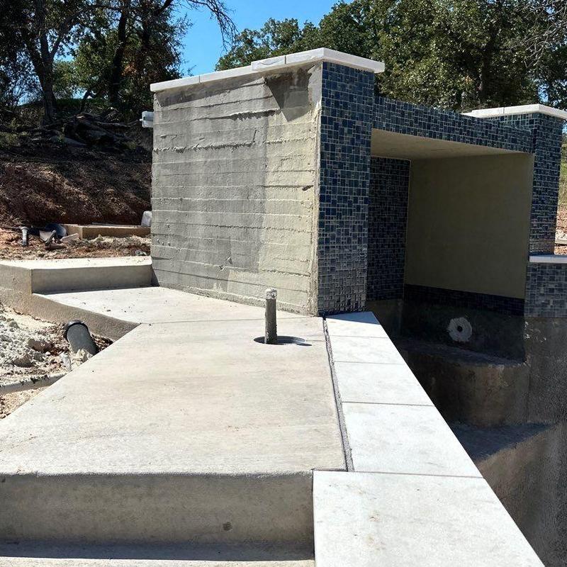 Pool coping and blue mosaic tile installation Pool coping and blue mosaic tile installation