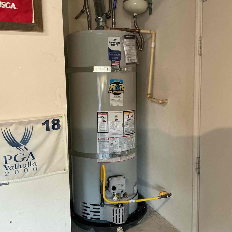 50-gallon water heater installation in utility closet