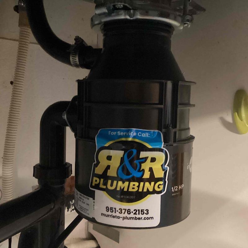 12-horsepower garbage disposal under kitchen sink