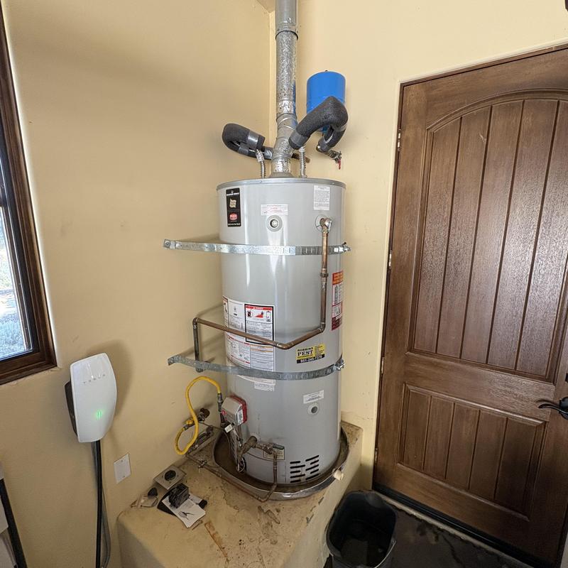 75-gallon water heater installation in utility room