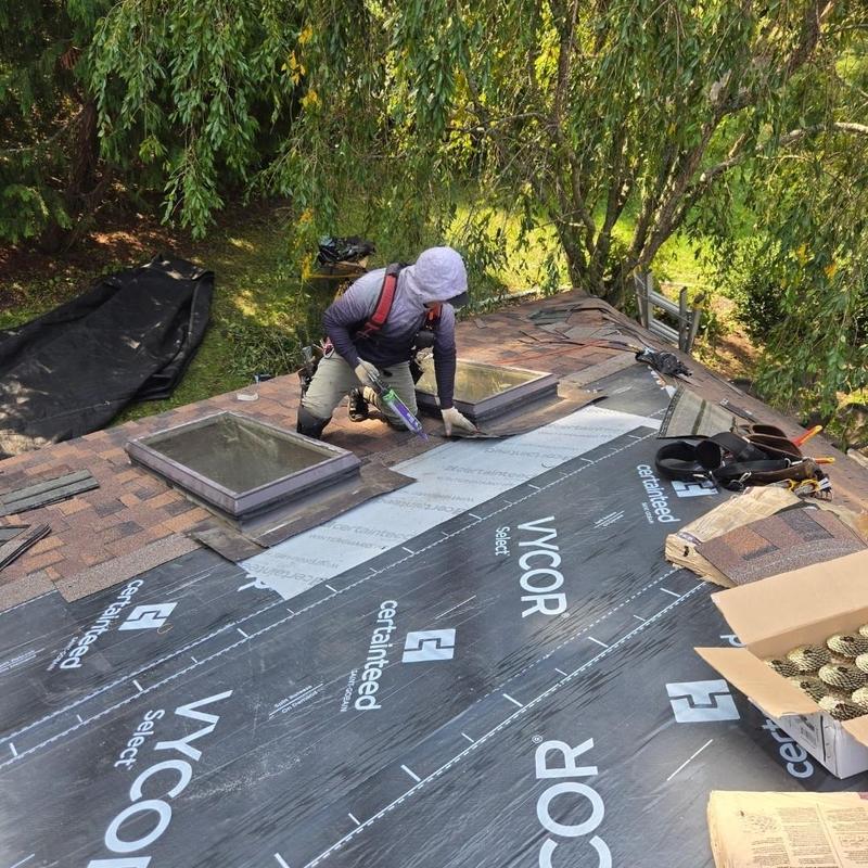 CertainTeed VYCOR roofing underlayment installation on skylight roof