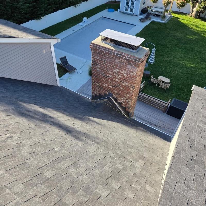 Chimney flashing and CertainTeed Landmark Pro shingles