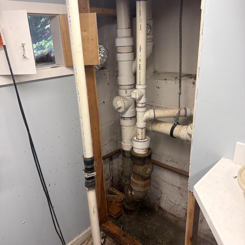 Main line sewer pipes with fittings and cleanouts Main line sewer pipes with fittings and cleanouts