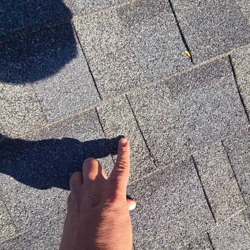 Shingle roof with hail damage inspection in Englewood