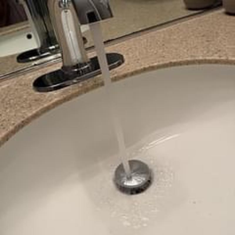 Sink overflow fitting with new silicone sealant