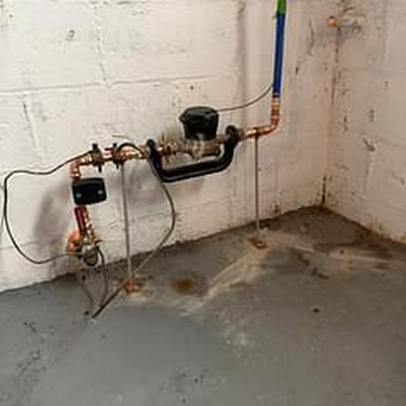 Water meter yoke and main shut off valve installation