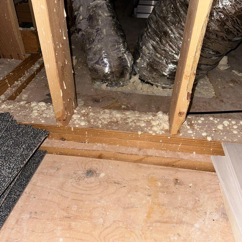 Ductwork insulation with expanding foam sealant in attic Ductwork insulation with expanding foam sealant in attic