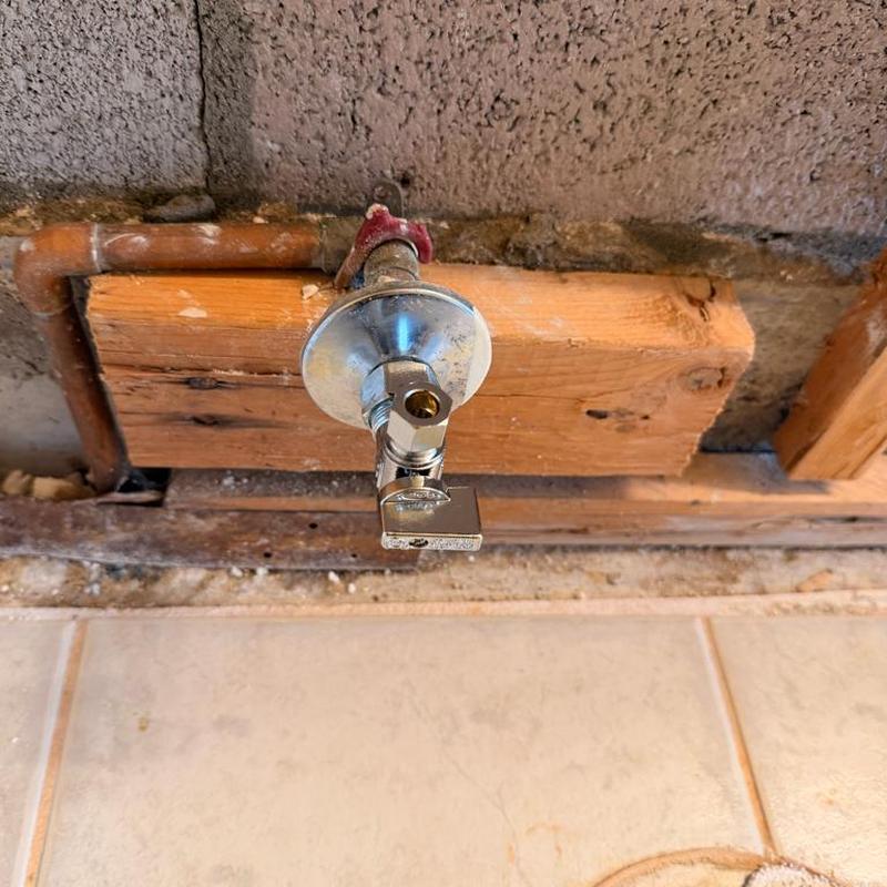 Toilet shut off valve with quarter turn handle installed