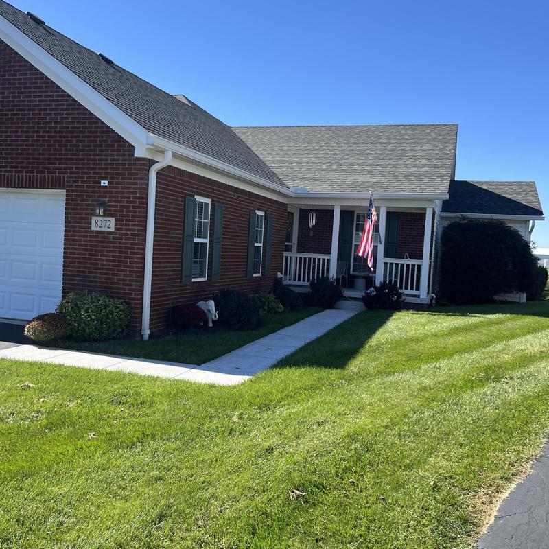 Porch post wrap on brick house exterior