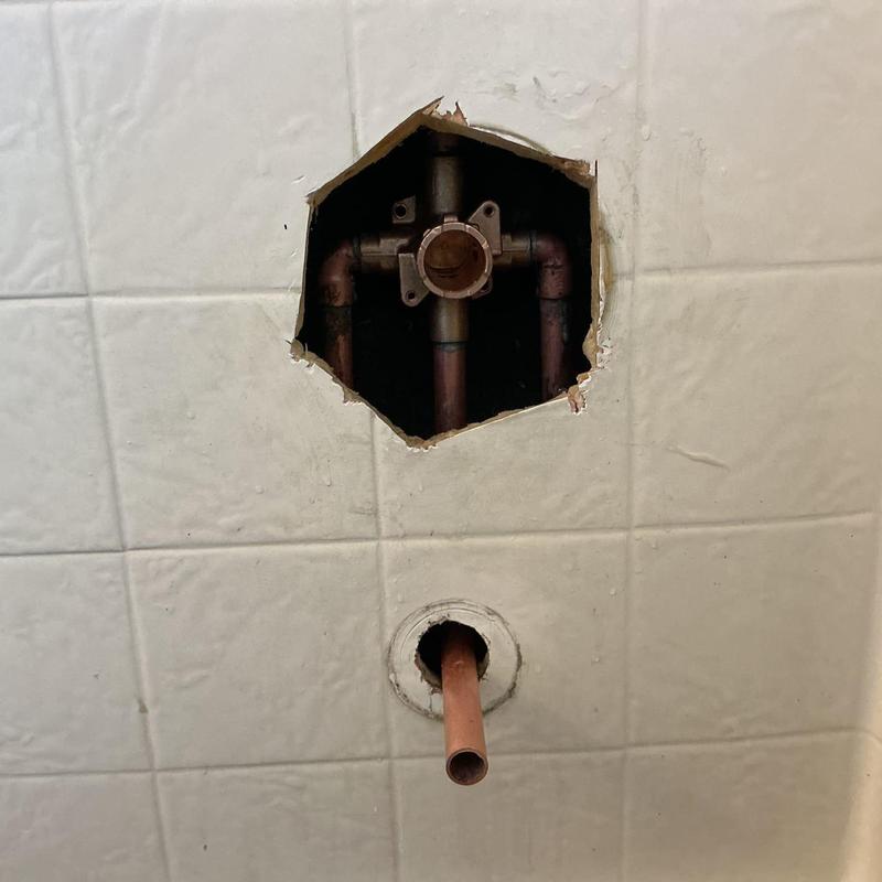Moen Posi-temp shower valve and pipe inside wall