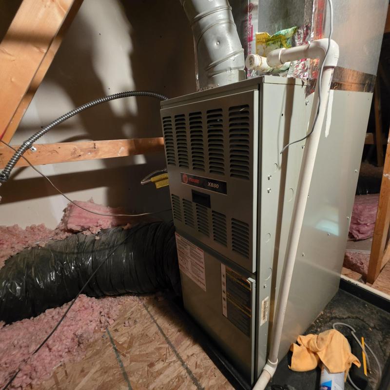 Trane XB80 furnace in attic with ductwork and piping Trane XB80 furnace in attic with ductwork and piping