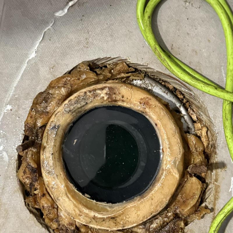 Main line cleanout with sealant and wiring nearby Main line cleanout with sealant and wiring nearby