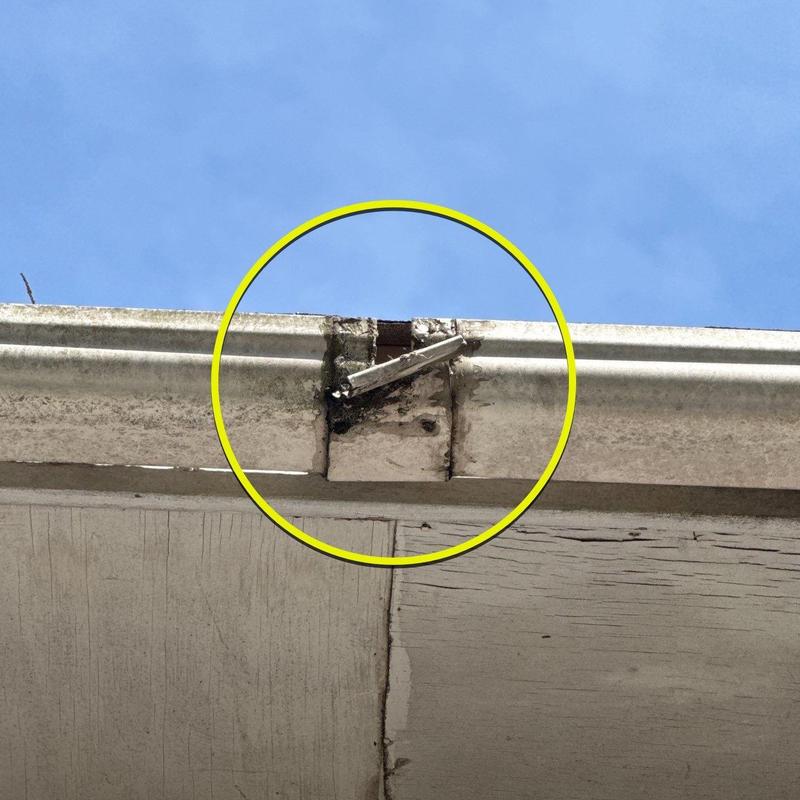 Gutter joint with detached downspout bracket