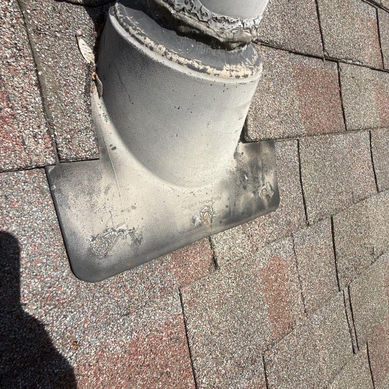 Roof vent flashing with wear and sealant damage