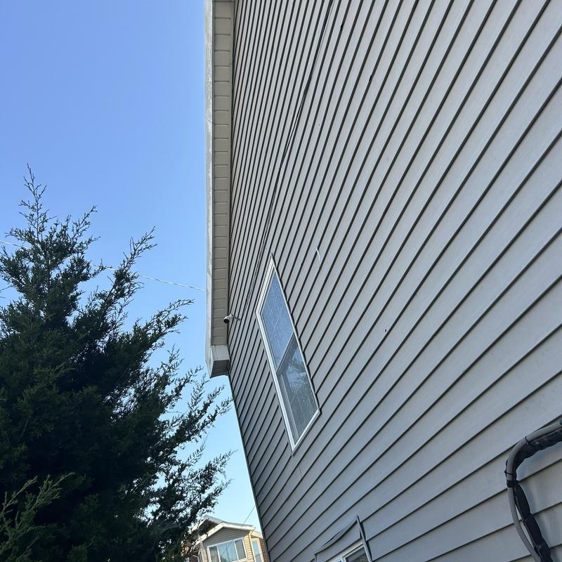 Vinyl siding installation on residential home exterior