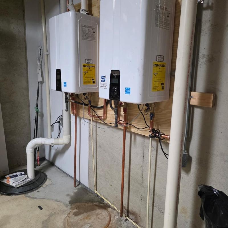 Navien tankless water heaters installed on wall