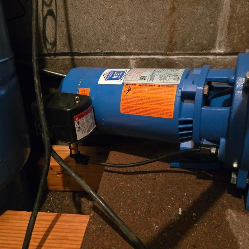 Pressure switch on blue water pump system in basement