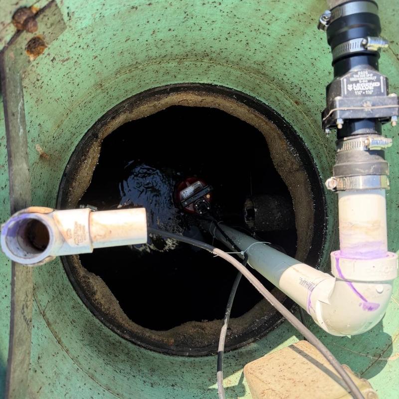 Septic pump with PVC piping inside tank