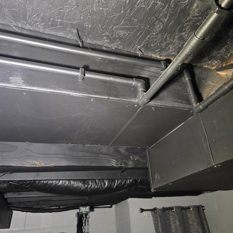 CPVC plumbing pipes installation in basement ceiling