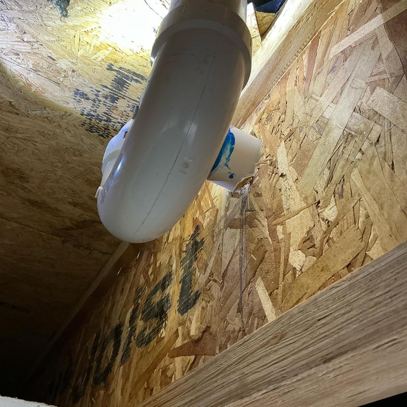Shower P-trap and drain installation between floors